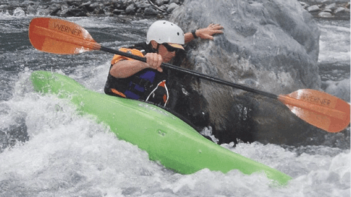 kayaker in broach position 